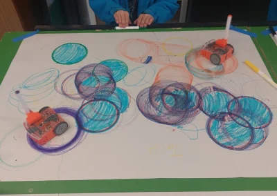 Drawing robots creating circle art