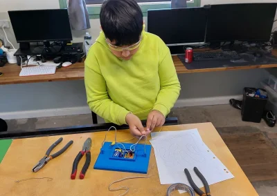 Student assembling 3d printed electronics game