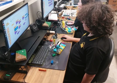 Student coding lego spike robot