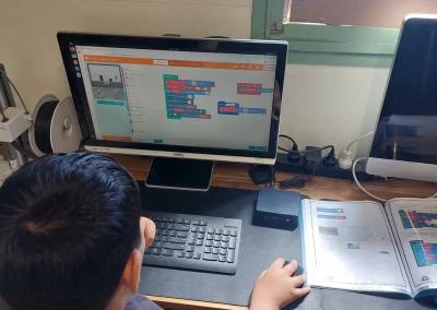 Student coding with makecode arcade