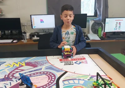 Student presenting lego robot