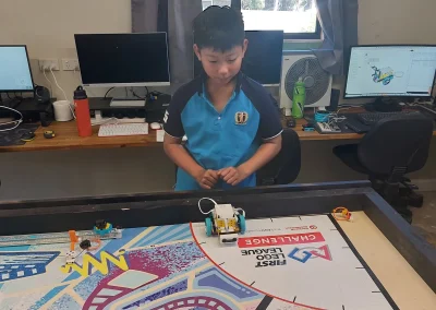 Student running robotics challenge