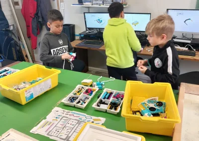Students selecting parts for robot build